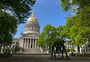 West Virginia And The State's Huge Bell At Its Capitol Building Wallpaper