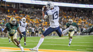 West Virginia Football Team Ready To Defend Big 12 Title Wallpaper