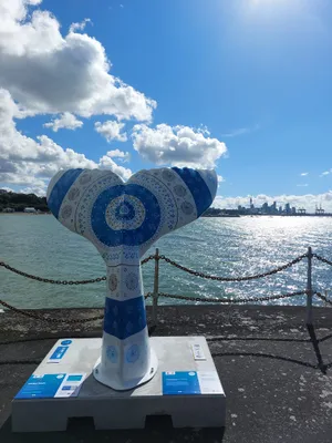 Whale Tail Sculpture Seafront Wallpaper