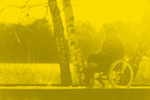 Wheelchair User Enjoying Outdoors Wallpaper