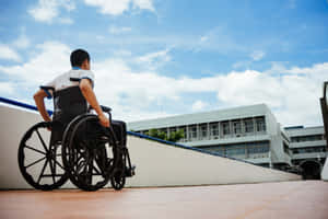 Wheelchair User Looking Upward Wallpaper