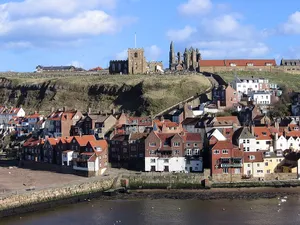 Whitby Abbey Overlooking Houses Wallpaper