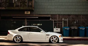 White B M W E46 Coupe Urban Backdrop Wallpaper