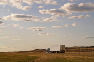 White Blue Truck At Field Wallpaper