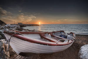 White Boat On The Seashore Wallpaper