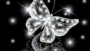 White Butterfly Majestically Fluttering Through The Air Wallpaper