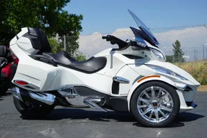 White Can Am Spyder Roadster Parked Outdoors Wallpaper