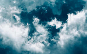 White Clouds Dark Blue Wallpaper