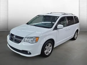 White Dodge Grand Caravanin Showroom Wallpaper