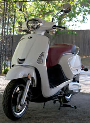 White Kymco Scooter Outdoor Setting Wallpaper