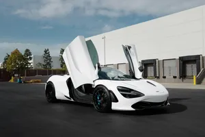White Mc Laren720 S With Doors Up Wallpaper