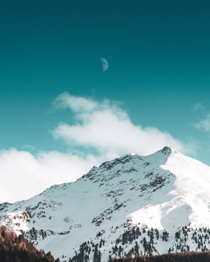 White Mountain And Teal Sky Wallpaper