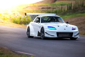 White Sports Car Sunset Road Wallpaper