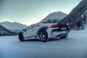 White Sports Car Winter Backdrop Wallpaper