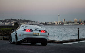 White Toyota Supra Car Near Bay Wallpaper