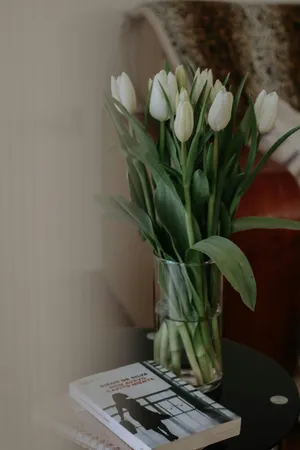 White Tulipsin Glass Vaseon Table Wallpaper