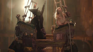 Wicked Movie Iconic Swing Scene Wallpaper