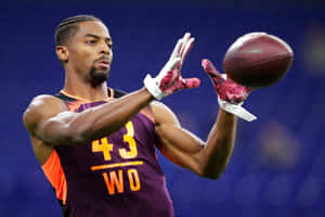 Wide Receiver Catching Football Drill Wallpaper