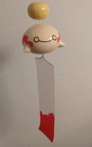 Wide Smile Of Chimecho Wallpaper