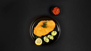 Wiener Schnitzel On Black Plate Wallpaper