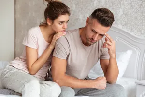 Wife Comforting Perturbed Husband Wallpaper