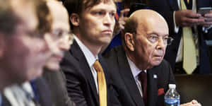 Wilbur Ross Delivering A Lecture Wallpaper