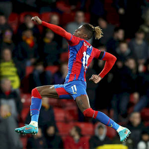 Wilfried Zaha Doing Victory Jump Wallpaper