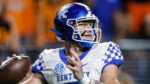 Will Levis Kentucky Quarterback Action Shot Wallpaper