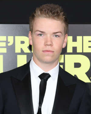 Will Poulter Black Suit Event Wallpaper