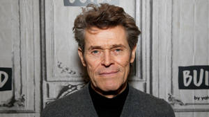 Willem Dafoe's Iconic Smirk Wallpaper