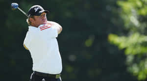 William Mcgirt Swinging A Club Wallpaper