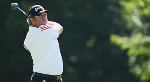 William Mcgirt Swinging A Club Wallpaper