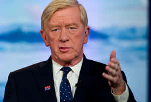 William Weld Giving Speech With Hand Gestures Wallpaper