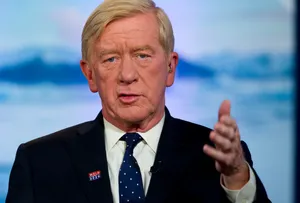William Weld Giving Speech With Hand Gestures Wallpaper