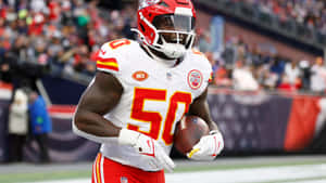 Willie Gay Kansas City Chiefs Action Wallpaper