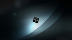 Windows 7 Logo On A Dark Background Wallpaper