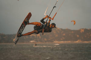 Windsurfing With A Cap Wallpaper