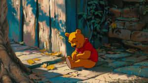 Winniethe Pooh Sitting Solitary Wallpaper