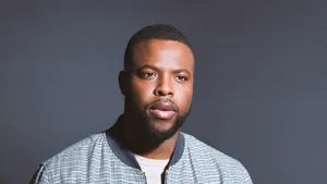 Winston Duke In A Candid Pose Wallpaper