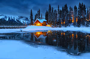 Winter_ Cottage_ Reflections Wallpaper