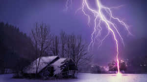 Winter_ Lightning_ Strike_ Over_ Snowy_ Cabin.jpg Wallpaper