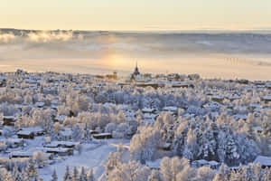 Winter Sunrise Over Ostersund Sweden Wallpaper