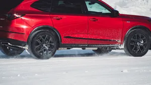 Winter Tires In Action During Heavy Snowfall Wallpaper