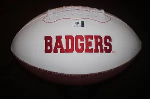 Wisconsin Badgers Football Team In Action Wallpaper