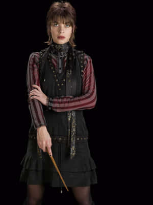 Witch_with_ Wand_in_ Black_ Background Wallpaper