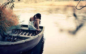 Woman Alone On Boat Wallpaper