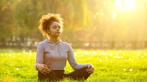 Woman Breathing And Meditating Wallpaper