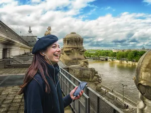 Woman Enjoying The View At Musée Dorsay Wallpaper