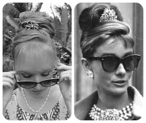 Woman Flaunting Her Retro Style Hairstyle Wallpaper