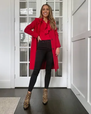 Woman In A Cozy Red Sweater Wallpaper